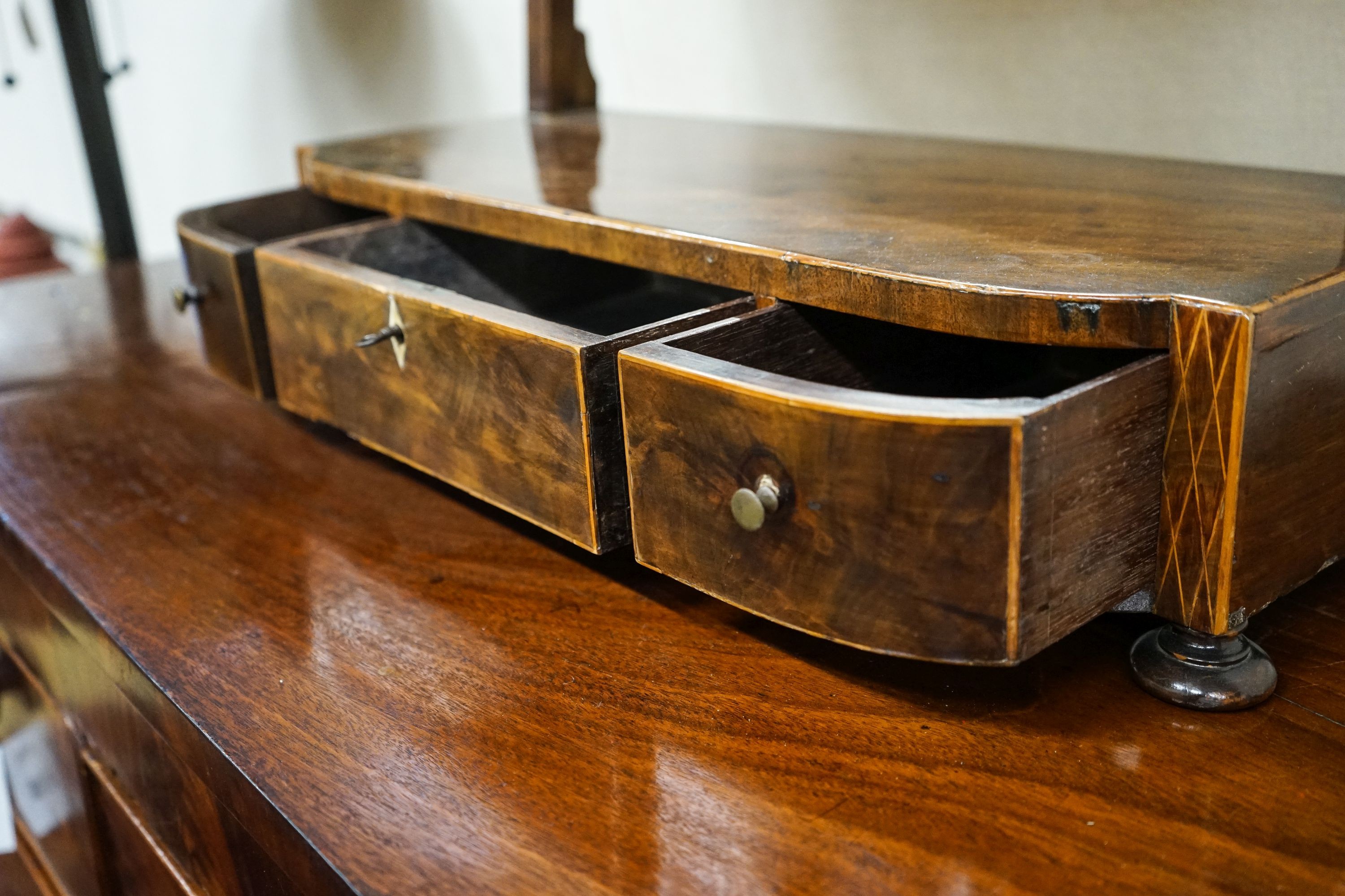 A George IV mahogany toilet mirror, with three drawer box base, width 58cm, depth 24cm, height 59cm